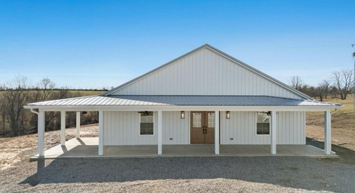 A residence at Powder Branch Farm with a covered porch
